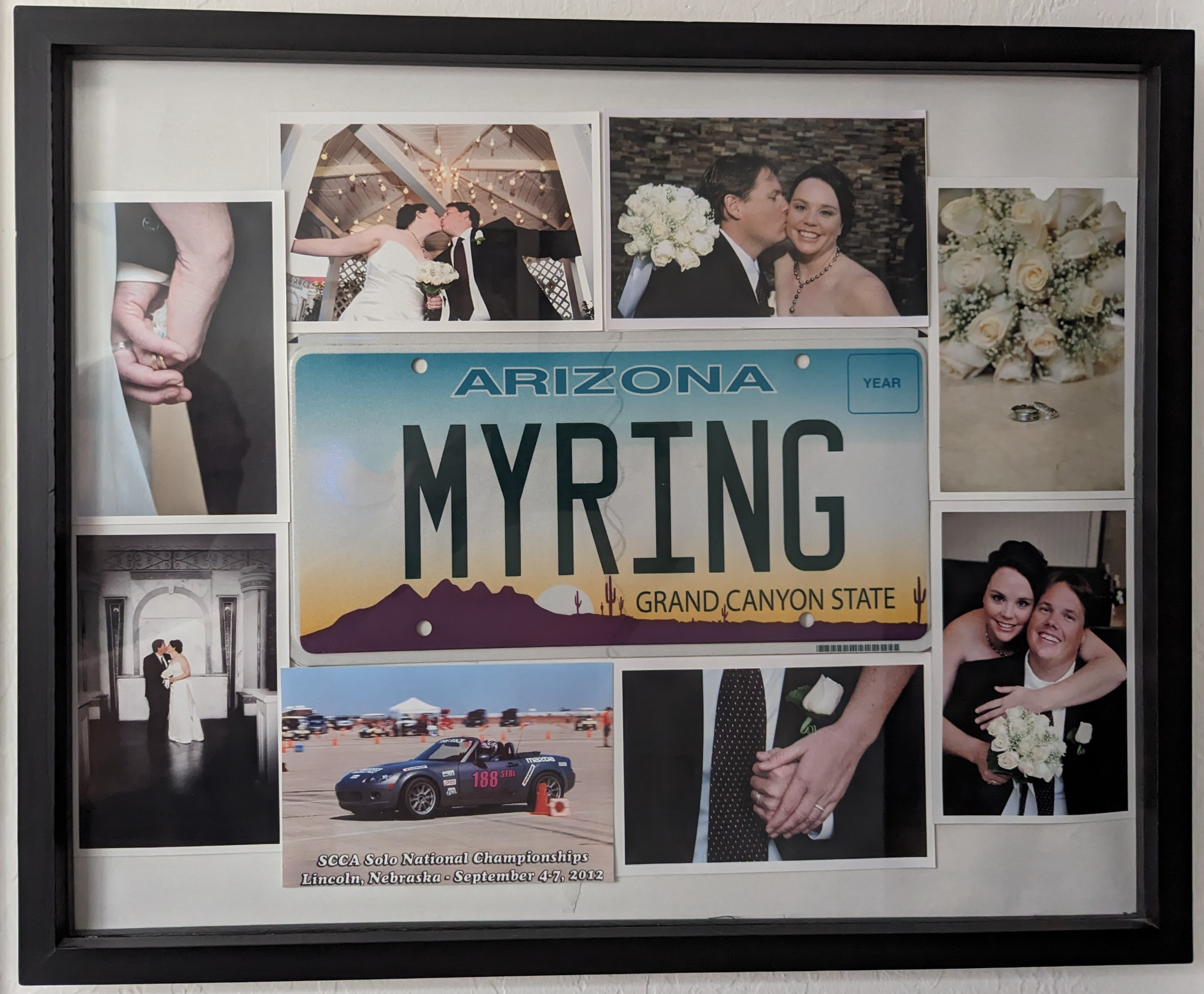 A picture of the wedding couple and their license plate.